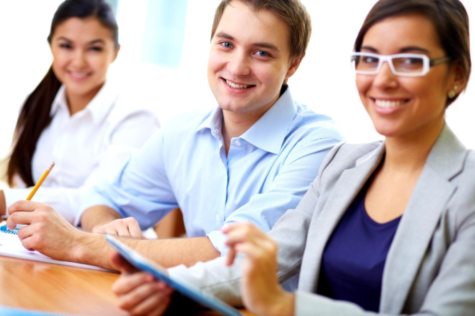 Workshop session with participants reviewing financial documents