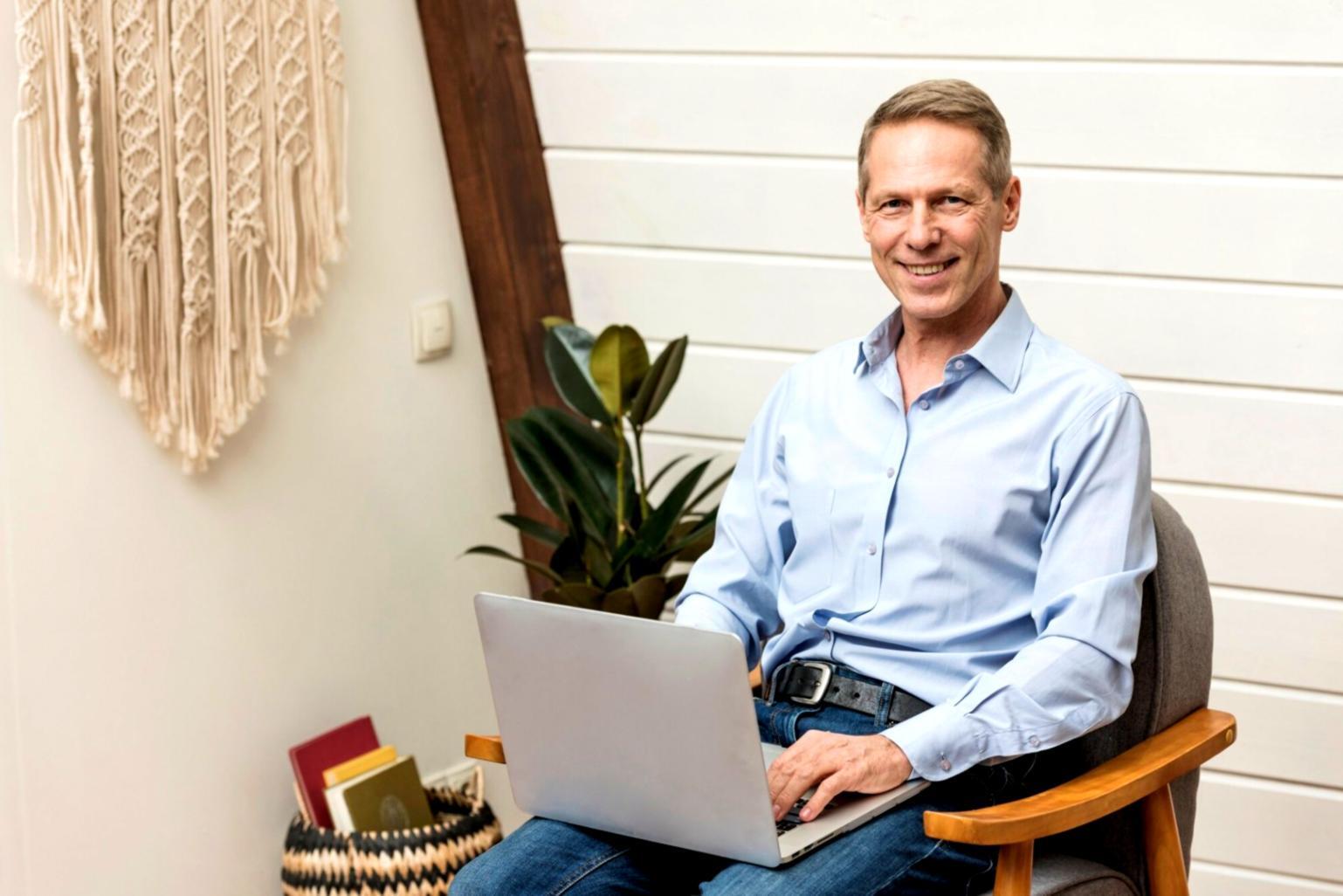 Group financial literacy class with students engaged in collaborative learning exercise